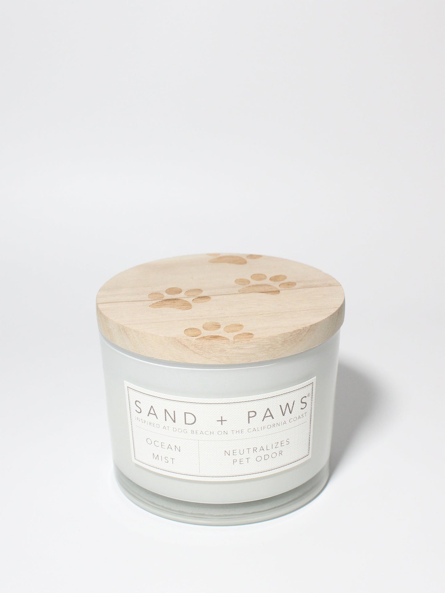 Sand + Paws Ocean Mist 12 oz scented candle White vessel with Carved Paw Print lid