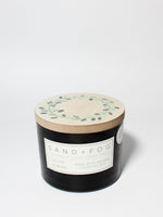 Olive Lemon 12 oz scented candle Black vessel with Olive Wreath lid